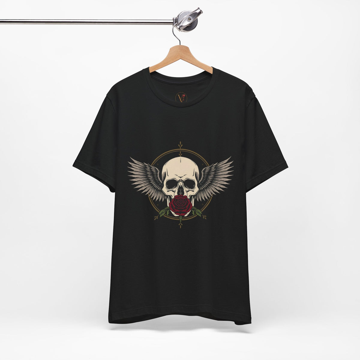 Vice & Velvet black cotton t-shirt featuring a gothic skull, rose, and wings graphic print on a wooden hanger.
